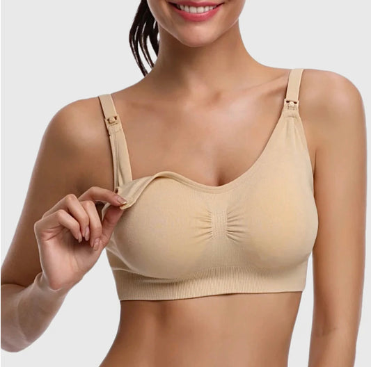 Beige bra worn by a model on a plain background